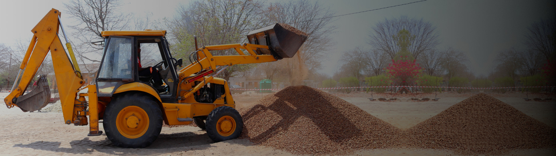 baner firmy PAW-KOP Paweł Stużyński z koparko-ładowarką
